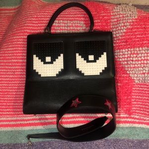 Les Petits Joueurs with strap stars